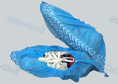 A sapata cirúrgica descartável não não tecida do patim cobre a cor azul 15 x 40cm